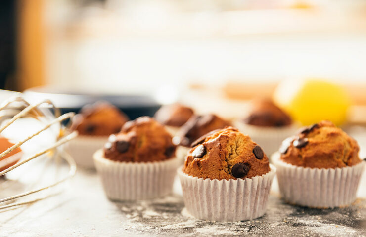 beautiful-woman-preparing-cookies-and-muffins-Q22QSQ4.jpg